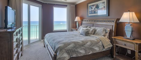 Master bedroom. King sized bed. Ocean view. Balcony access. 