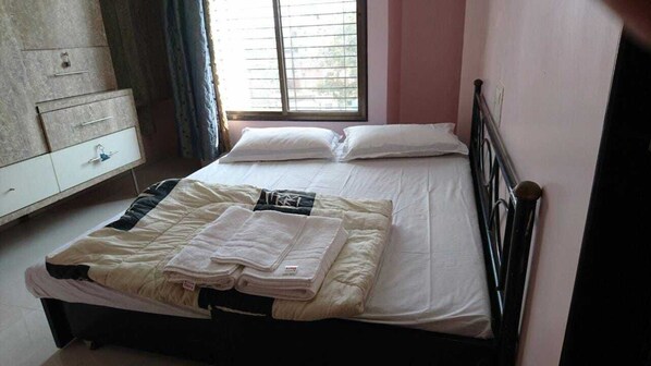 Bedroom #1 with attached toilet..