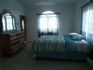 Private Bedroom with Queen Bed and Dresser