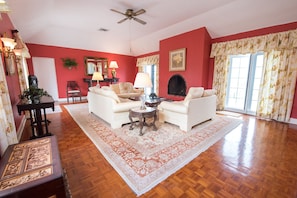 Upper level sitting room with fireplace