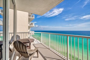 Enjoy Stunning Views and Tropical Breezes from Your Private Beachfront Balcony