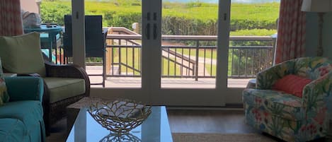 Living room looking out to deck and ocean