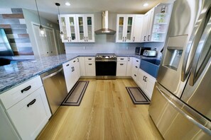 Kitchen fully renovated in 2024! Open plan kitchen includes full size fridge