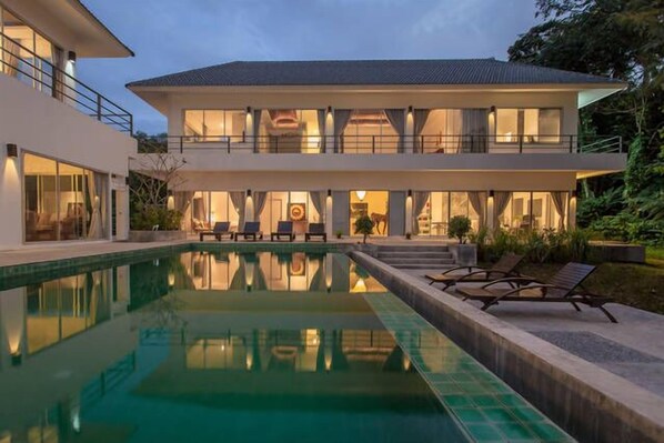 Beautiful night view of the villa at dusk.