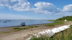 The view of the harbor and beach at the end of the town way.