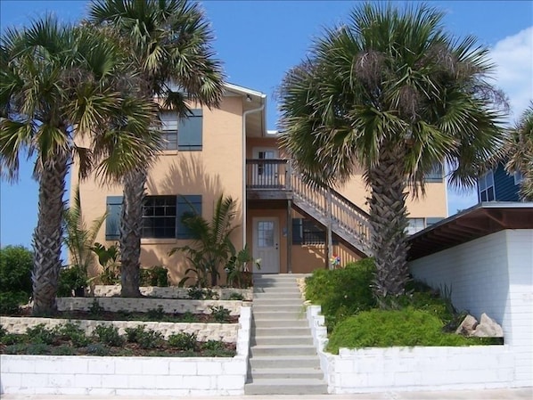 Exterior Front - Direct Ocean Front - porch in front & large covered back deck.