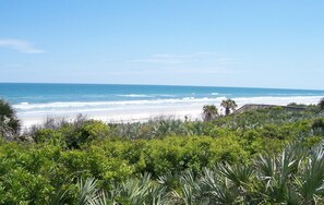 View from the porch. Head down the wood walk-way and- toes in the sand!