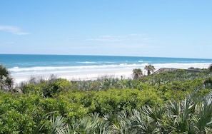 View from the porch. Head down the wood walk-way and- toes in the sand!