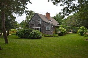yard is quite large and lush this is the side approach