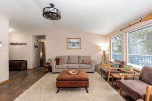 The large windows let in plenty of natural lighting. 