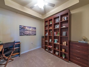 Full size Murphy bed behind bookcase. Office desk w/ chair. 