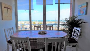 dining table, view to Marina Port and the sea