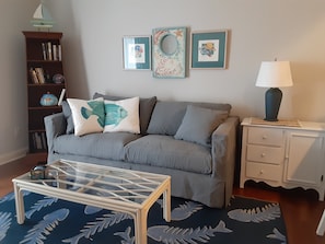 First floor:  Living room with queen sleeper sofa.