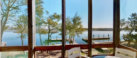 Marsh Mellow has plenty of room on the screened in porch for the entire family to enjoy morning coffee and watch the sunrise.