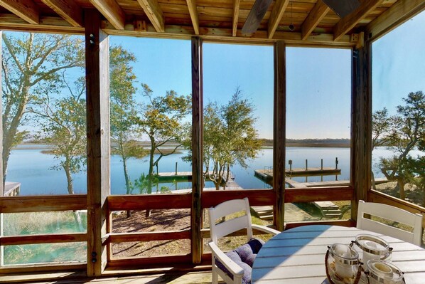 Marsh Mellow has plenty of room on the screened in porch for the entire family to enjoy morning coffee and watch the sunrise.