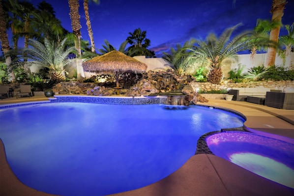 Tahiti Style Waterfall, Lounging under Palapa umbrella, Salt Water Pool and Spa