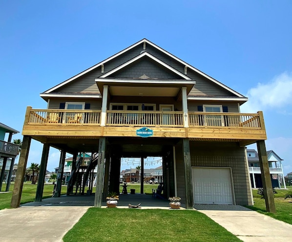 Front facing street and beach.