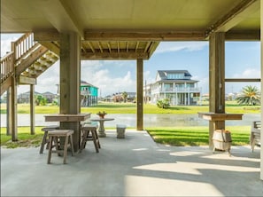 Under house seating overlooking water canal