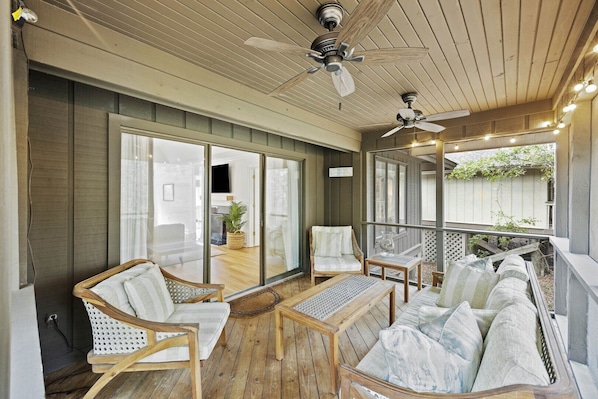 Enjoy the screened in porch at 80 Inlet Cove!