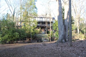 Rear of house. Covered porch runs the length of the house.