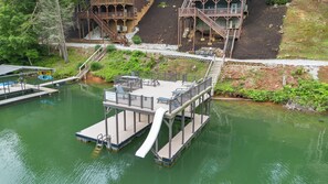Private 2-story dock w/ slide, covered boat slip, up to 3 boats.
