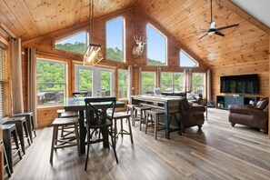 Main Level Great room - Kitchen table and sofa table with seating for 12