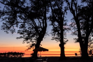 Beachfront patios at sunset