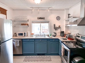 Large kitchen with grill outside