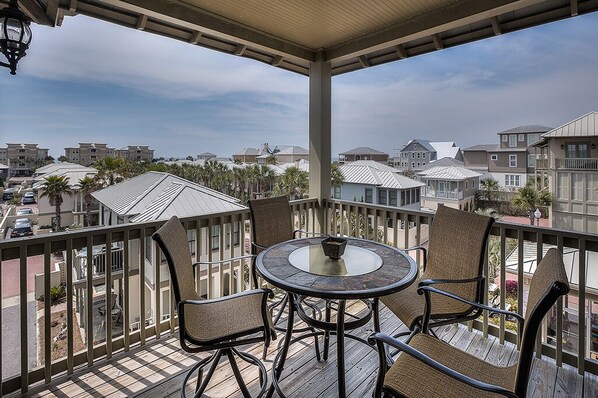 Outdoor Table and Chairs in the Balcony.