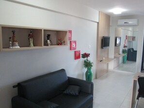 sala com sofá cama 