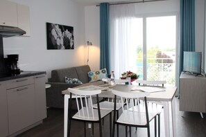 The living area is modern and comfortable, perfect for relaxing after a great day.