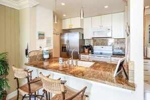 Cute breakfast bar perfect for spending time cooking together