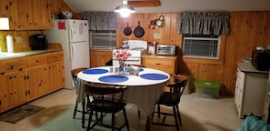 Small, but efficient kitchen area is open to the main living area