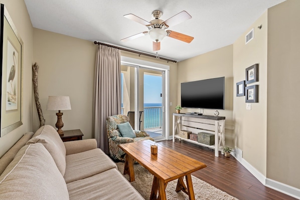 Living room with door directly to the balcony