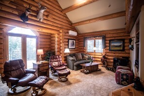 Living Area. Hand crafted coffee table and side tables with carved feet.