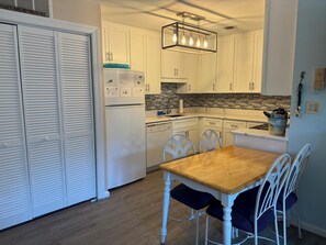 Kitchen with Utility closet/Laundry to the left