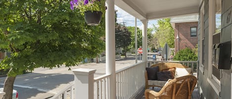 Front Porch-comfortable sitting area, very sunny all afternoon-evening.