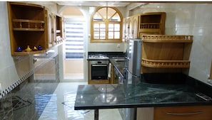 Kitchen Showing Door to 2nd West-Facing Balcony