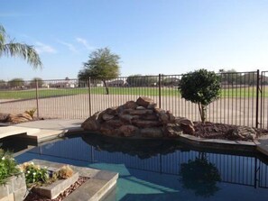 The waterfall adds charm and fun.