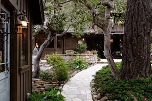 Meandering path from detached guest room to main house.