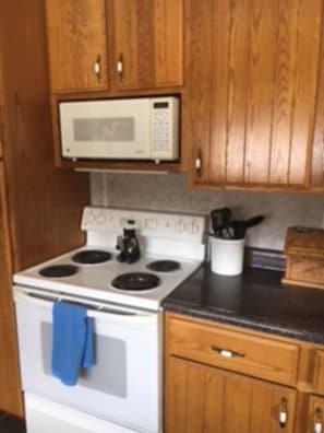 Kitchen.  Electric stove, dishwasher, microwave.