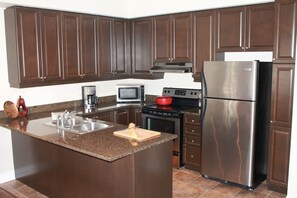 Prepare gourmet meals in a fully stocked kitchen with modern appliances