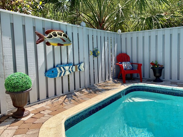 Enclosed private pool with three foot and 6 foot depths.