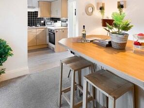 Dining area with open aspect to kitchen | Coaster’s Retreat, Bridlington