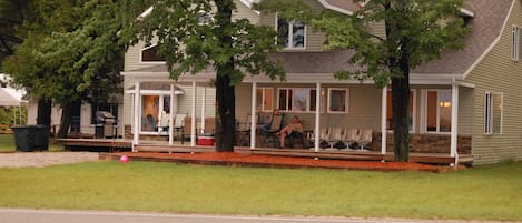 Front view of home standing at lake front