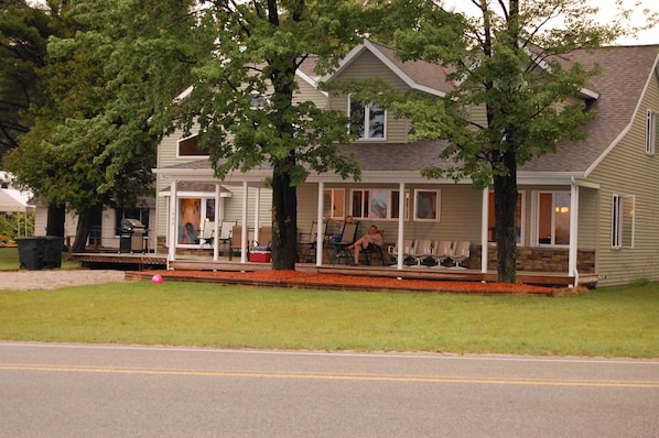 Front view of home standing at lake front
