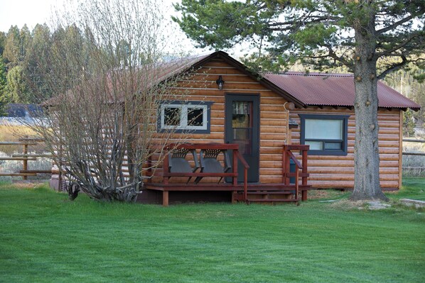 Front view of cabin with deck