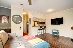 Enjoy the 55" wall mounted TV.
