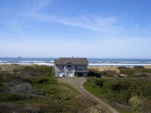 VIEW  OF BEACH COMBER.  THE BEACH IS ABOUT 50 FEET WEST  WITH NO CLOSE NEIGHBORS