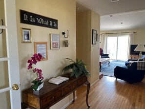 MAIN FLOOR ENTRY (SECOND FLOOR)
LOOKING TO THE LIVING ROOM TO THE DECK , OCEAN